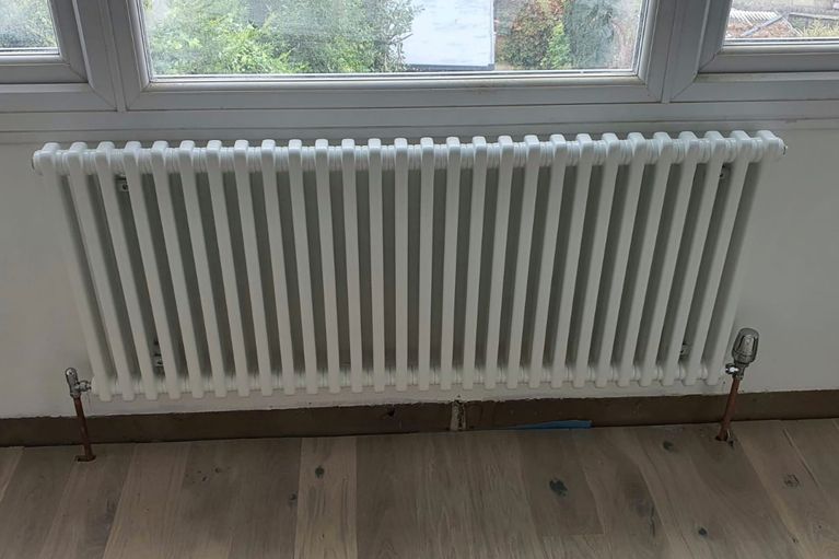 White Collumn Radiator installation by Dr Oz Gas & Heating Engineer